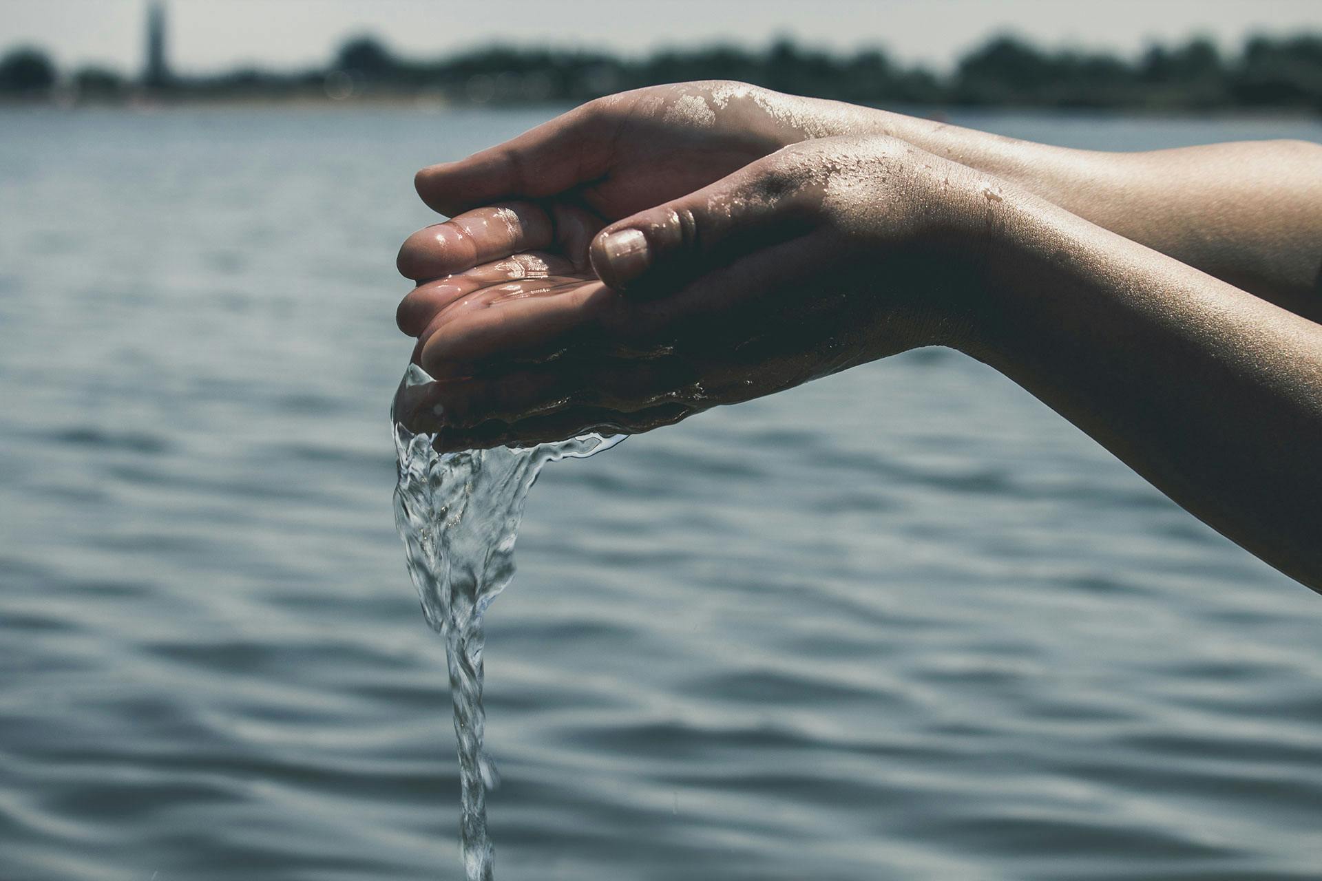 water pouring from hands